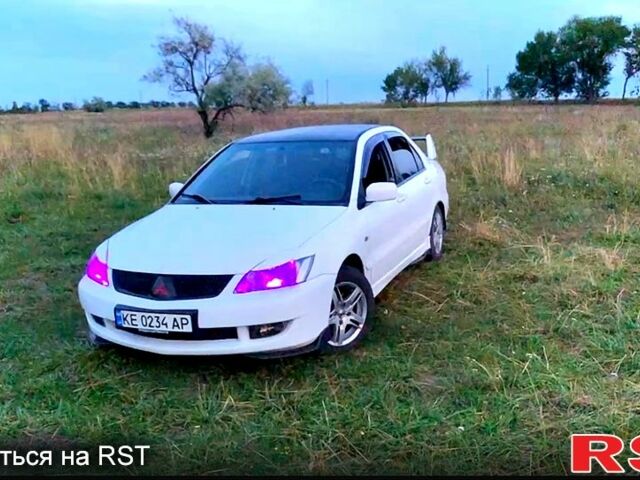 Білий Міцубісі Lancer, об'ємом двигуна 1.6 л та пробігом 250 тис. км за 4700 $, фото 1 на Automoto.ua