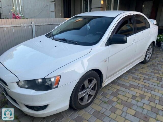 Білий Міцубісі Lancer, об'ємом двигуна 2 л та пробігом 391 тис. км за 6500 $, фото 1 на Automoto.ua