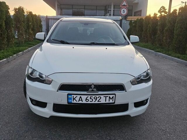 Білий Міцубісі Lancer, об'ємом двигуна 2 л та пробігом 214 тис. км за 6200 $, фото 1 на Automoto.ua