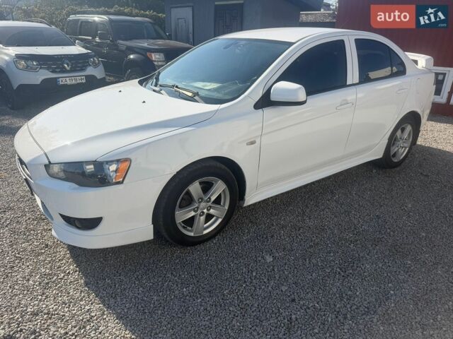 Білий Міцубісі Lancer, об'ємом двигуна 2 л та пробігом 287 тис. км за 5900 $, фото 1 на Automoto.ua