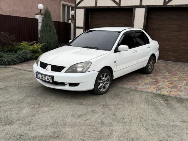 Білий Міцубісі Lancer, об'ємом двигуна 1.6 л та пробігом 285 тис. км за 3500 $, фото 1 на Automoto.ua