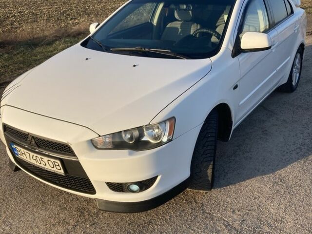 Белый Мицубиси Лансер, объемом двигателя 2 л и пробегом 270 тыс. км за 6500 $, фото 1 на Automoto.ua
