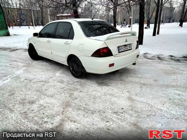 Білий Міцубісі Lancer, об'ємом двигуна 1.6 л та пробігом 222 тис. км за 5500 $, фото 1 на Automoto.ua