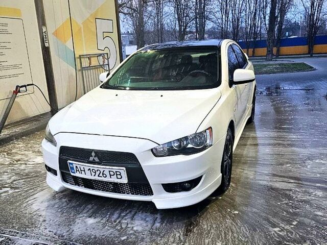 Белый Мицубиси Лансер, объемом двигателя 2 л и пробегом 208 тыс. км за 7600 $, фото 1 на Automoto.ua