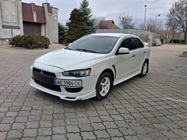Белый Мицубиси Лансер, объемом двигателя 1.5 л и пробегом 247 тыс. км за 6500 $, фото 1 на Automoto.ua