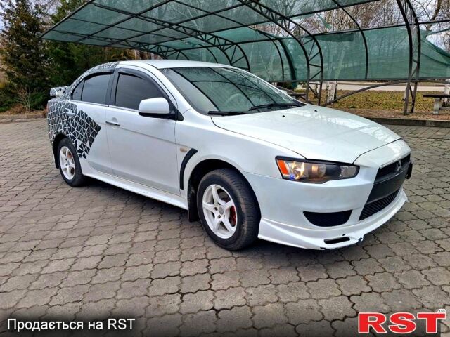 Білий Міцубісі Lancer, об'ємом двигуна 1.5 л та пробігом 250 тис. км за 5000 $, фото 1 на Automoto.ua