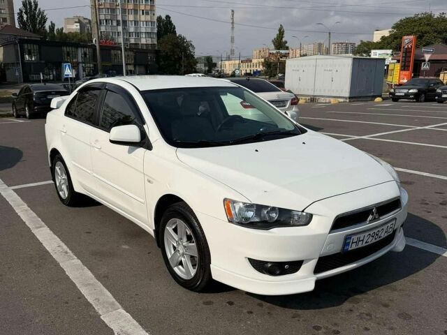 Білий Міцубісі Lancer, об'ємом двигуна 2 л та пробігом 195 тис. км за 5100 $, фото 1 на Automoto.ua