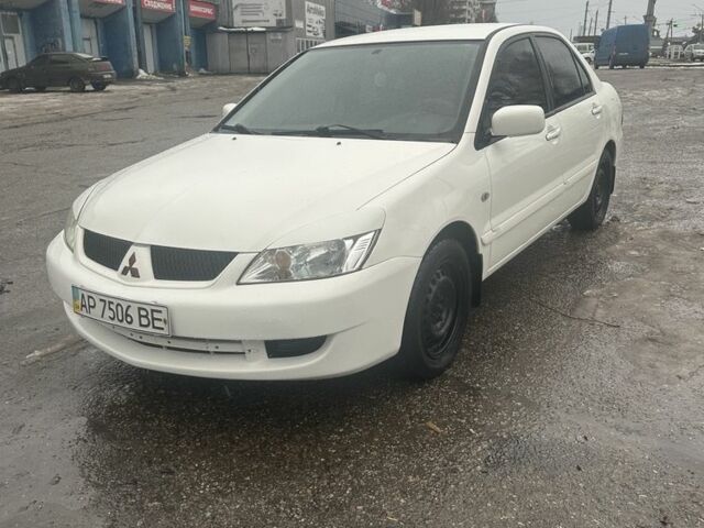 Білий Міцубісі Lancer, об'ємом двигуна 1.6 л та пробігом 250 тис. км за 3500 $, фото 1 на Automoto.ua