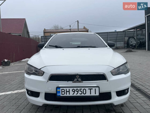 Белый Мицубиси Лансер, объемом двигателя 1.47 л и пробегом 196 тыс. км за 6900 $, фото 1 на Automoto.ua
