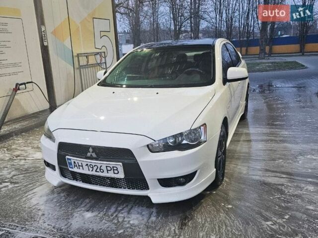 Белый Мицубиси Лансер, объемом двигателя 2 л и пробегом 208 тыс. км за 7600 $, фото 1 на Automoto.ua