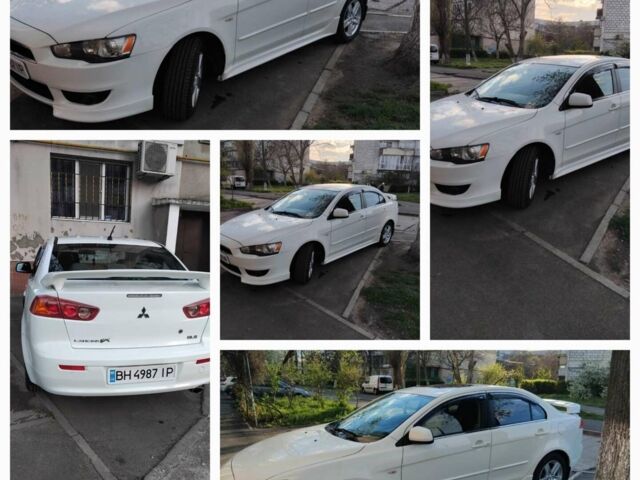 Білий Міцубісі Lancer, об'ємом двигуна 2 л та пробігом 200 тис. км за 8000 $, фото 1 на Automoto.ua