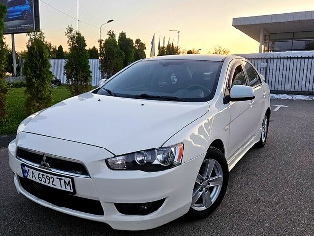 Білий Міцубісі Lancer, об'ємом двигуна 2 л та пробігом 214 тис. км за 6000 $, фото 1 на Automoto.ua
