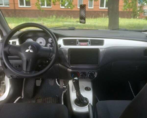 Білий Міцубісі Lancer, об'ємом двигуна 1.6 л та пробігом 230 тис. км за 5000 $, фото 1 на Automoto.ua