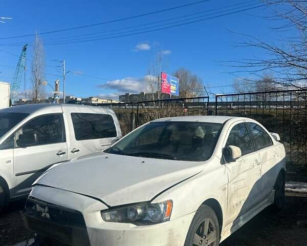 Білий Міцубісі Lancer, об'ємом двигуна 2 л та пробігом 210 тис. км за 2800 $, фото 1 на Automoto.ua