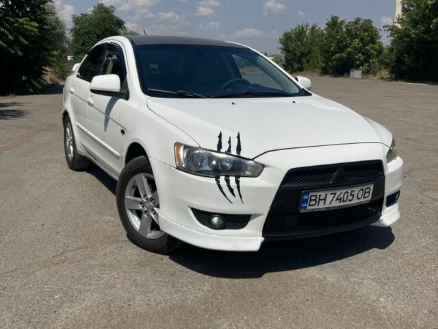 Білий Міцубісі Lancer, об'ємом двигуна 2 л та пробігом 275 тис. км за 6100 $, фото 1 на Automoto.ua