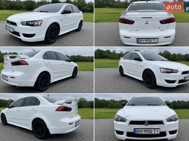 Белый Мицубиси Лансер, объемом двигателя 1.47 л и пробегом 196 тыс. км за 6500 $, фото 1 на Automoto.ua