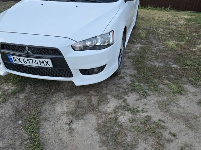 Белый Мицубиси Лансер, объемом двигателя 2 л и пробегом 262 тыс. км за 5000 $, фото 1 на Automoto.ua