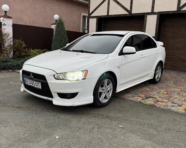 Білий Міцубісі Lancer, об'ємом двигуна 2 л та пробігом 269 тис. км за 6000 $, фото 1 на Automoto.ua