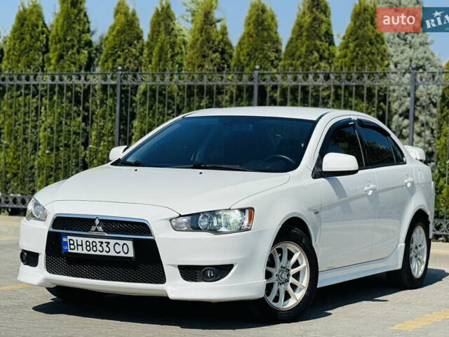 Білий Міцубісі Lancer, об'ємом двигуна 2 л та пробігом 163 тис. км за 6500 $, фото 1 на Automoto.ua