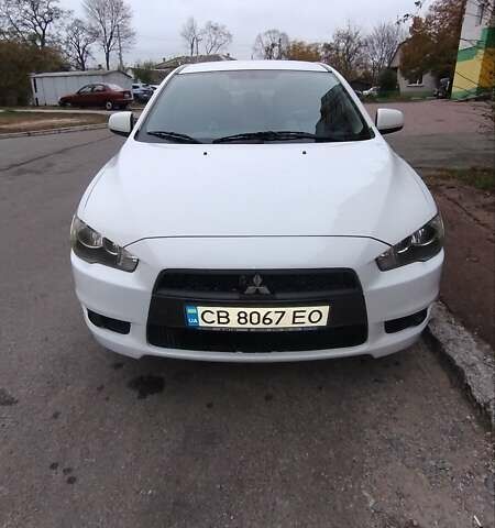 Білий Міцубісі Lancer, об'ємом двигуна 2 л та пробігом 209 тис. км за 7500 $, фото 1 на Automoto.ua