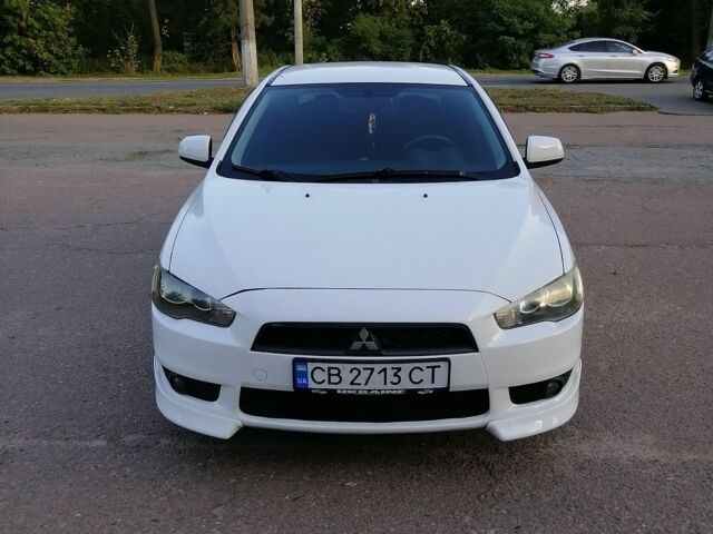 Білий Міцубісі Lancer, об'ємом двигуна 2 л та пробігом 240 тис. км за 6999 $, фото 1 на Automoto.ua