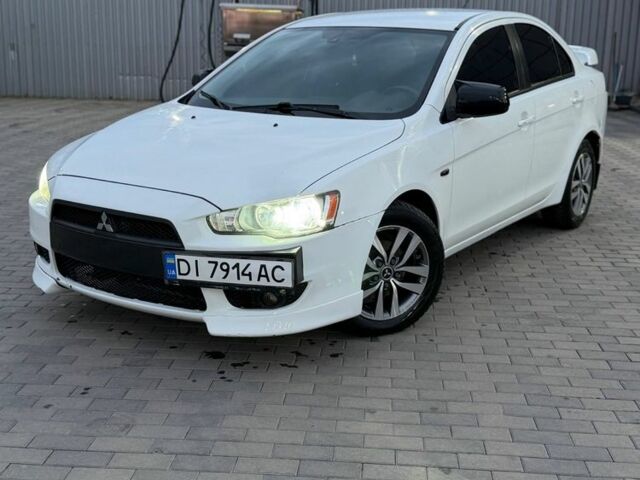 Белый Мицубиси Лансер, объемом двигателя 2 л и пробегом 1000 тыс. км за 5700 $, фото 1 на Automoto.ua