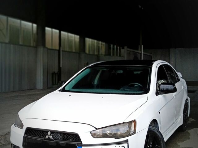 Білий Міцубісі Lancer, об'ємом двигуна 2 л та пробігом 300 тис. км за 4892 $, фото 1 на Automoto.ua