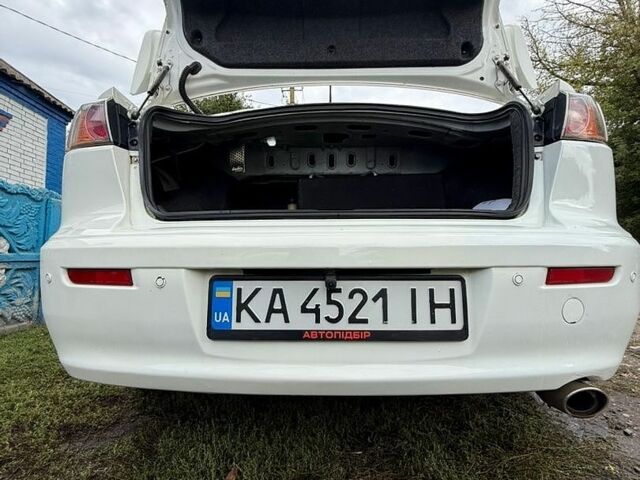 Білий Міцубісі Lancer, об'ємом двигуна 2 л та пробігом 180 тис. км за 7800 $, фото 1 на Automoto.ua