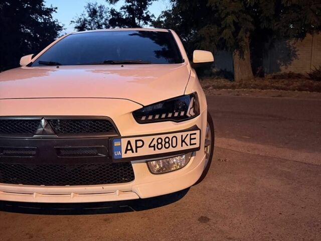 Білий Міцубісі Lancer, об'ємом двигуна 2 л та пробігом 236 тис. км за 6500 $, фото 1 на Automoto.ua