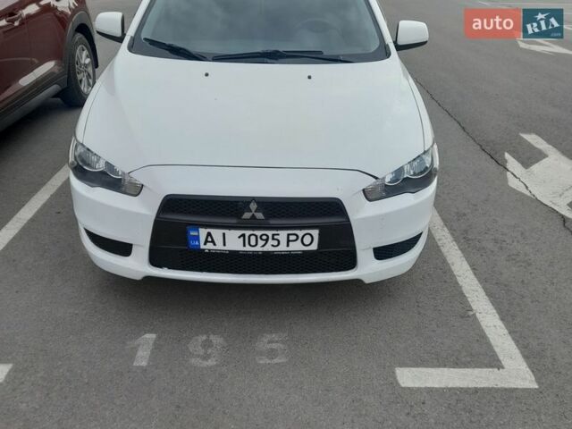 Белый Мицубиси Лансер, объемом двигателя 1.5 л и пробегом 243 тыс. км за 6200 $, фото 1 на Automoto.ua