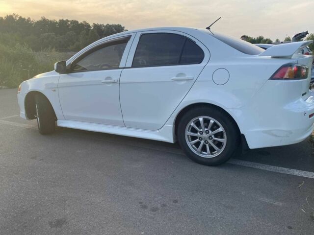 Білий Міцубісі Lancer, об'ємом двигуна 1.5 л та пробігом 218 тис. км за 6000 $, фото 1 на Automoto.ua