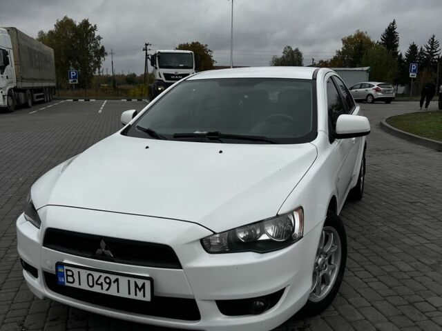 Білий Міцубісі Lancer, об'ємом двигуна 1.5 л та пробігом 200 тис. км за 6000 $, фото 1 на Automoto.ua