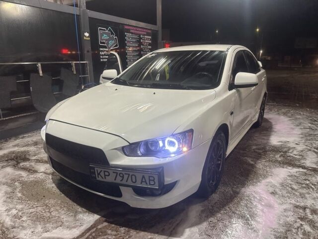 Белый Мицубиси Лансер, объемом двигателя 1.6 л и пробегом 301 тыс. км за 7000 $, фото 1 на Automoto.ua