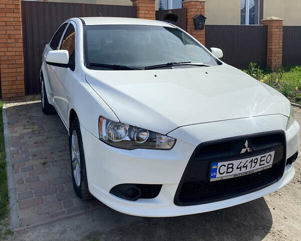 Белый Мицубиси Лансер, объемом двигателя 1.6 л и пробегом 227 тыс. км за 6400 $, фото 1 на Automoto.ua