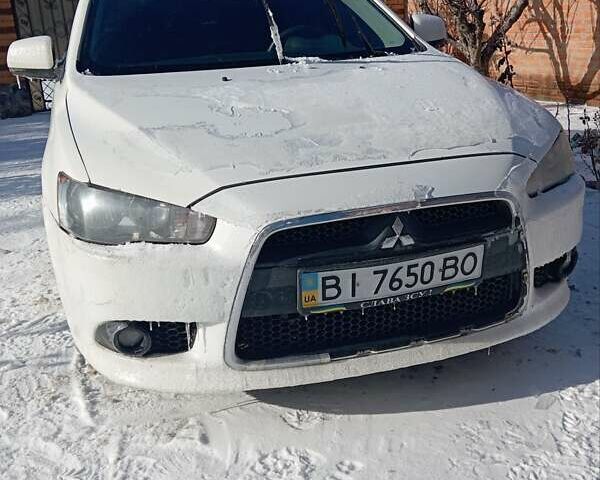 Белый Мицубиси Лансер, объемом двигателя 1.8 л и пробегом 180 тыс. км за 5800 $, фото 1 на Automoto.ua