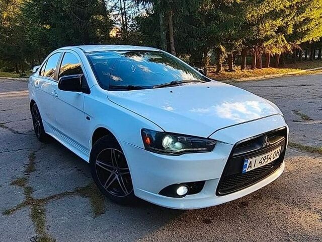 Білий Міцубісі Lancer, об'ємом двигуна 1.6 л та пробігом 231 тис. км за 5888 $, фото 1 на Automoto.ua