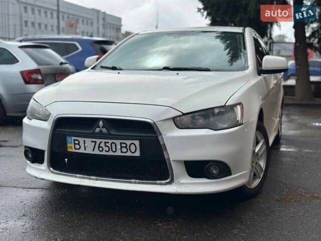 Белый Мицубиси Лансер, объемом двигателя 1.8 л и пробегом 184 тыс. км за 5999 $, фото 1 на Automoto.ua