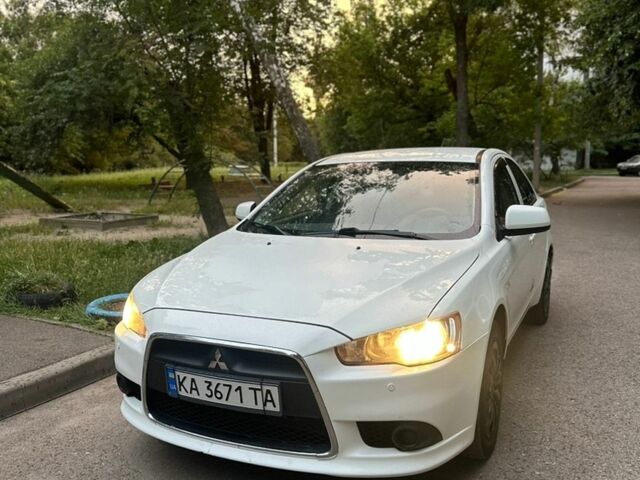Білий Міцубісі Lancer, об'ємом двигуна 1.59 л та пробігом 249 тис. км за 6700 $, фото 1 на Automoto.ua