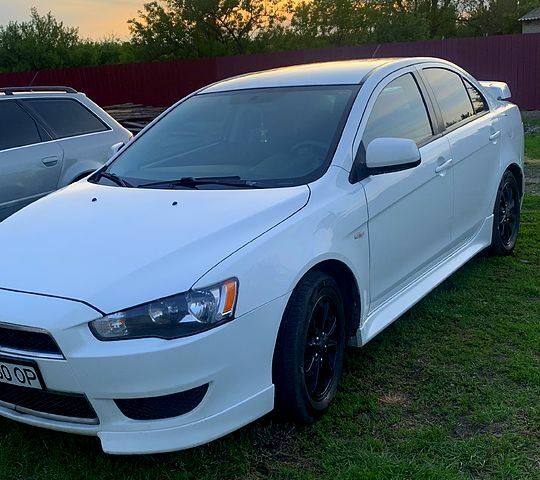 Білий Міцубісі Lancer, об'ємом двигуна 2.4 л та пробігом 232 тис. км за 7700 $, фото 1 на Automoto.ua
