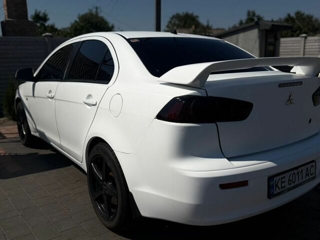 Білий Міцубісі Lancer, об'ємом двигуна 1.59 л та пробігом 182 тис. км за 6900 $, фото 1 на Automoto.ua