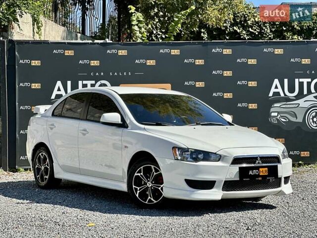 Белый Мицубиси Лансер, объемом двигателя 2 л и пробегом 124 тыс. км за 7700 $, фото 1 на Automoto.ua