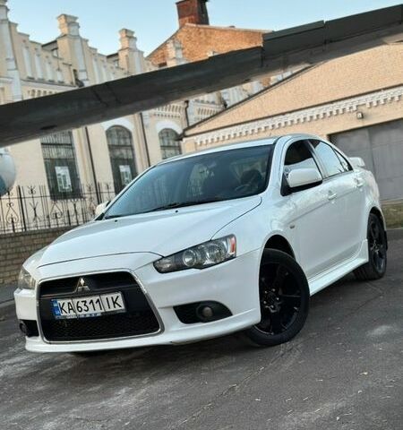 Белый Мицубиси Лансер, объемом двигателя 1.6 л и пробегом 215 тыс. км за 6600 $, фото 1 на Automoto.ua