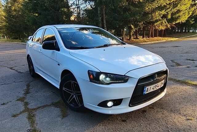 Білий Міцубісі Lancer, об'ємом двигуна 1.6 л та пробігом 242 тис. км за 5990 $, фото 1 на Automoto.ua