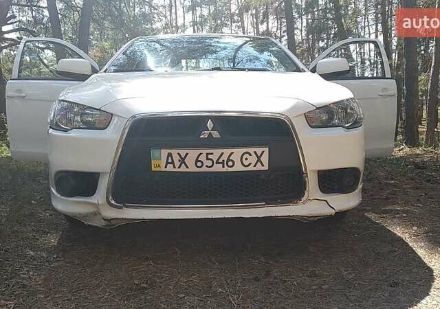Білий Міцубісі Lancer, об'ємом двигуна 1.6 л та пробігом 155 тис. км за 9000 $, фото 1 на Automoto.ua