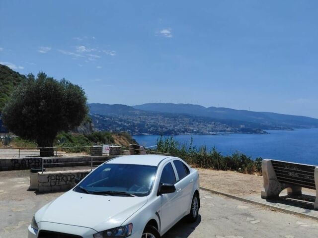 Белый Мицубиси Лансер, объемом двигателя 1.6 л и пробегом 260 тыс. км за 8700 $, фото 1 на Automoto.ua