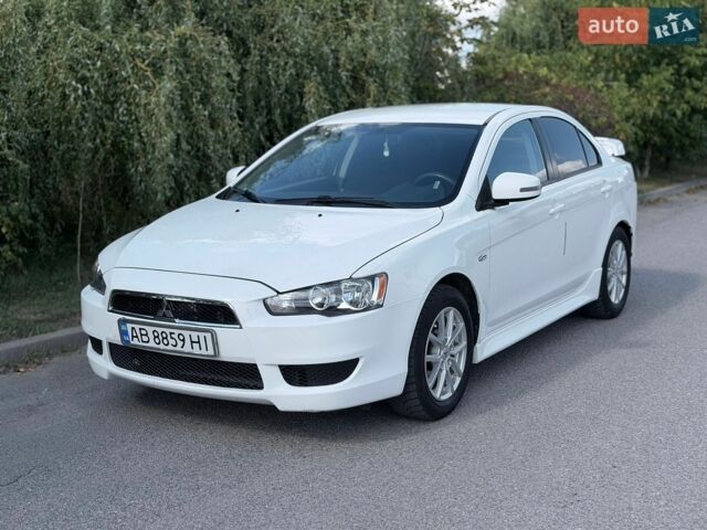 Білий Міцубісі Lancer, об'ємом двигуна 2 л та пробігом 135 тис. км за 8400 $, фото 1 на Automoto.ua