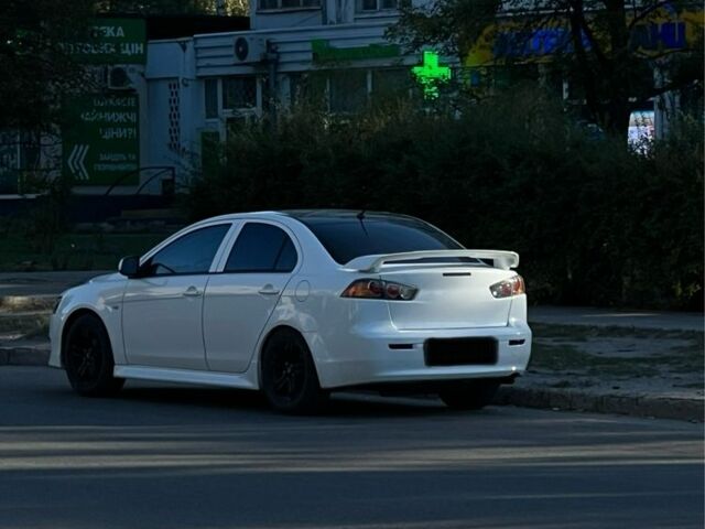 Білий Міцубісі Lancer, об'ємом двигуна 2.4 л та пробігом 208 тис. км за 7800 $, фото 1 на Automoto.ua