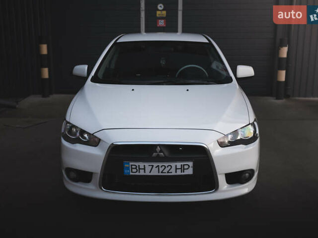 Білий Міцубісі Lancer, об'ємом двигуна 1.6 л та пробігом 248 тис. км за 8500 $, фото 1 на Automoto.ua