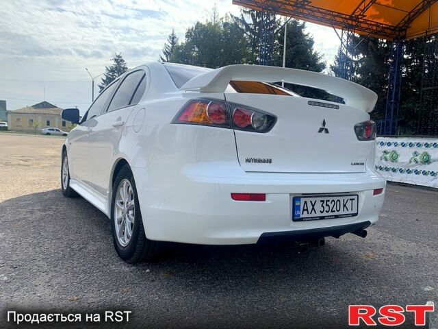Белый Мицубиси Лансер, объемом двигателя 2 л и пробегом 132 тыс. км за 9200 $, фото 1 на Automoto.ua