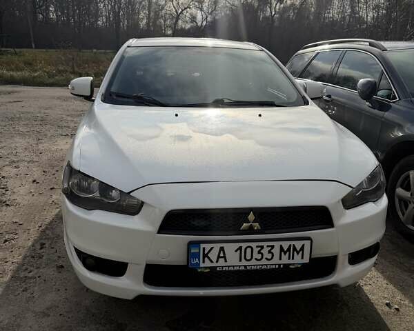 Білий Міцубісі Lancer, об'ємом двигуна 2 л та пробігом 146 тис. км за 7700 $, фото 1 на Automoto.ua
